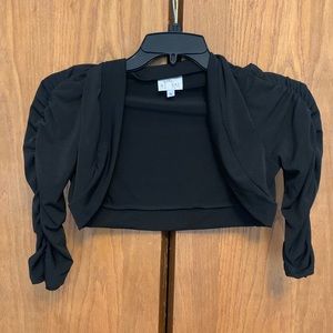 Black shoulder shrug